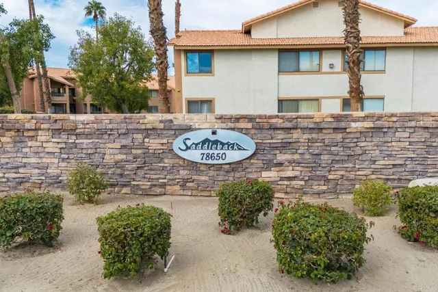 an aerial view of residential house and green space