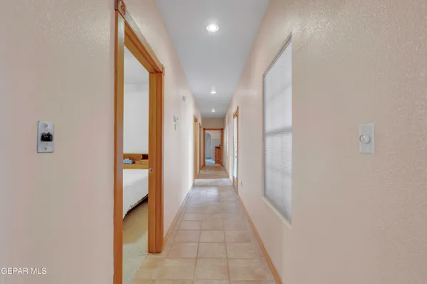 a view of a hallway with a furniture