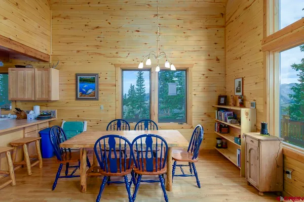 a kitchen that has a sink and a refrigerator