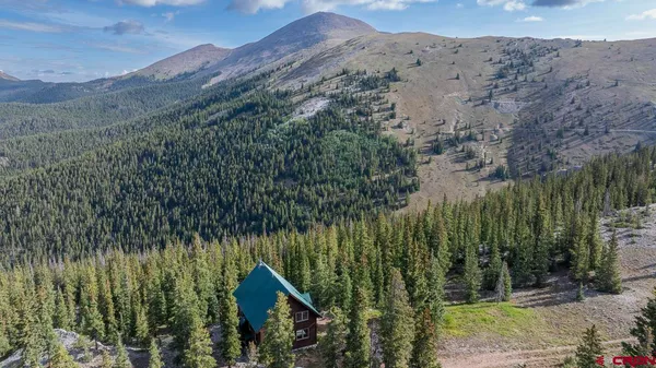 a view of a city with mountains in the background