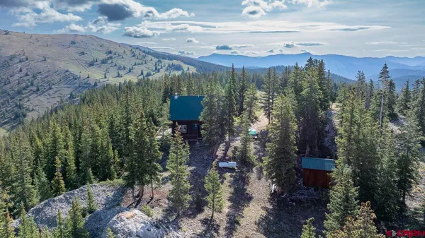 a view of a yard with an outdoor space
