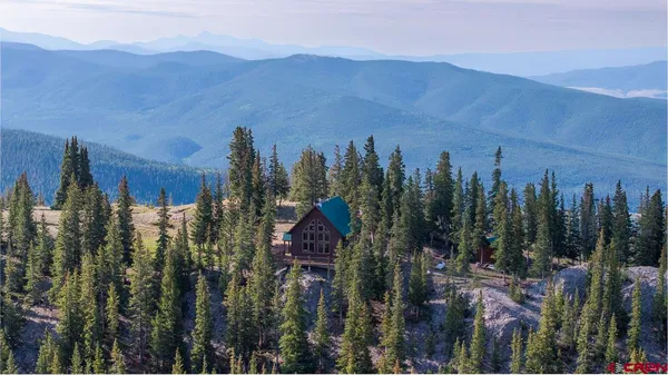 a view of a lake with a mountain in the background