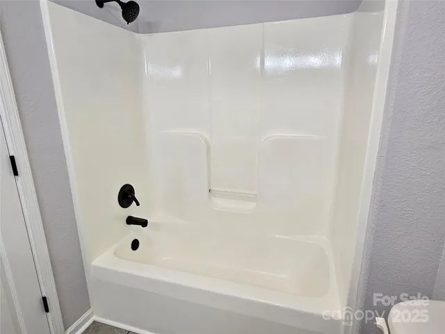 a bathroom with a tub