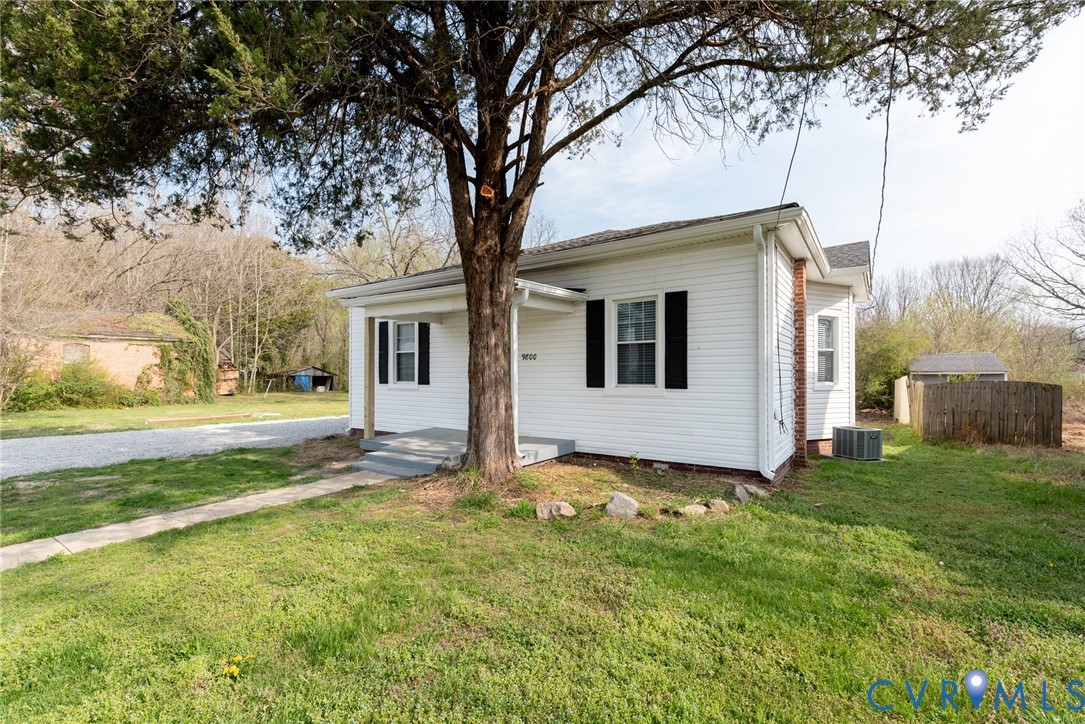 9800 Golf Course Drive Disputanta, VA 23842 - Photo 3 of 19 a view of a house with a yard