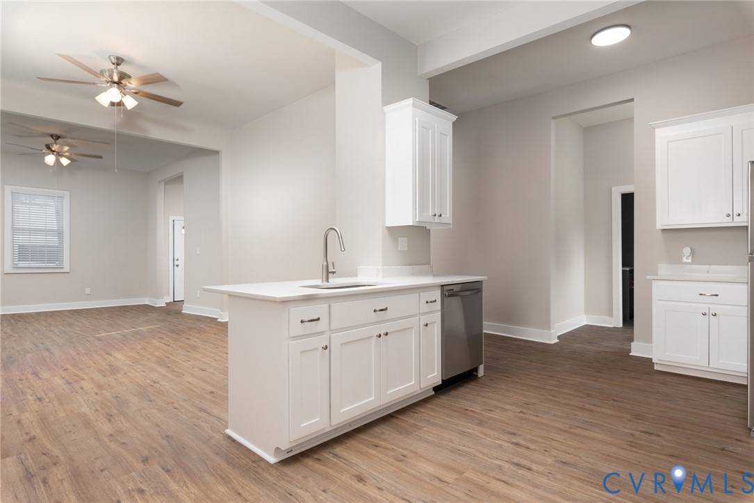 9800 Golf Course Drive Disputanta, VA 23842 - Photo 6 of 19 a view with cabinets and wooden floor
