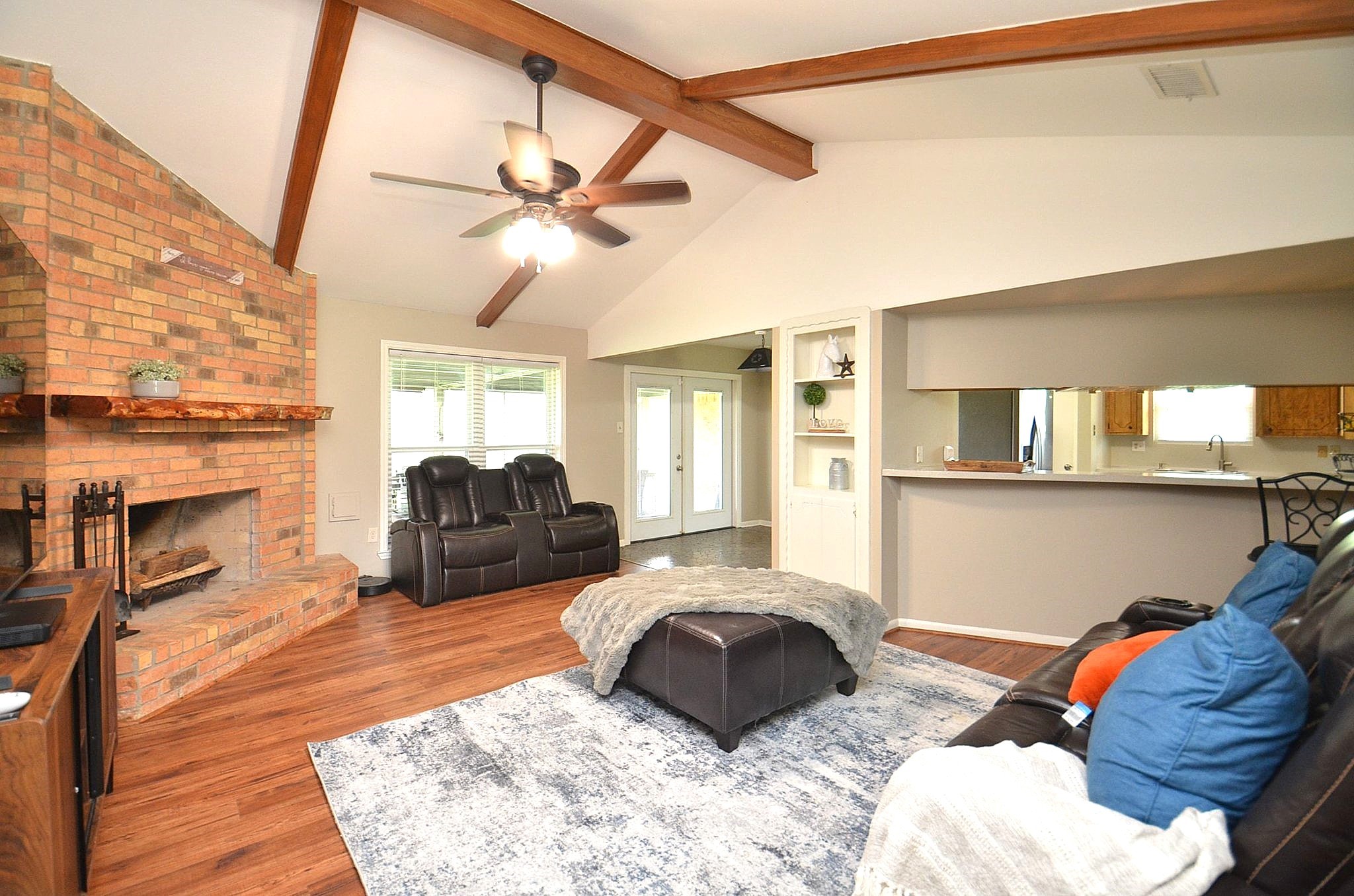 2500 County Road 62 Rosharon, TX 77583 - Photo 14 of 48 a large bedroom with a bed and wooden floor