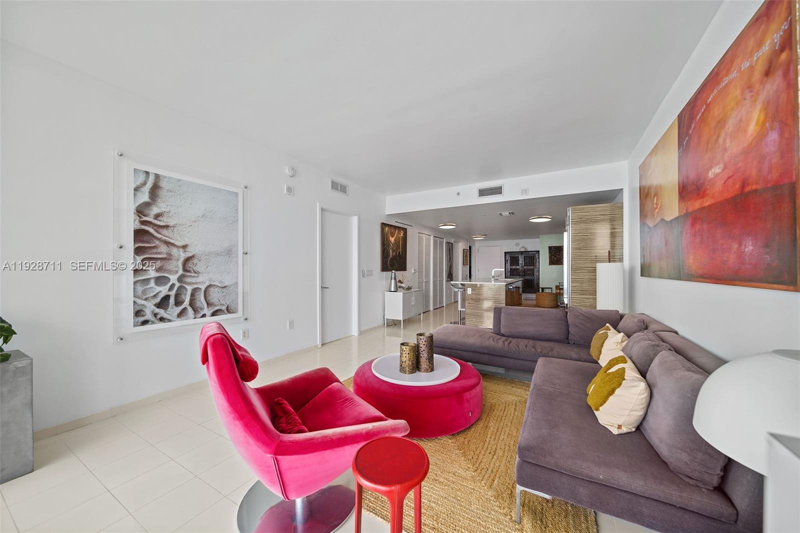 460 Northeast 28th Street, Unit 3904 Miami, FL 33137 - Photo 11 of 54 a living room with furniture and kitchen view