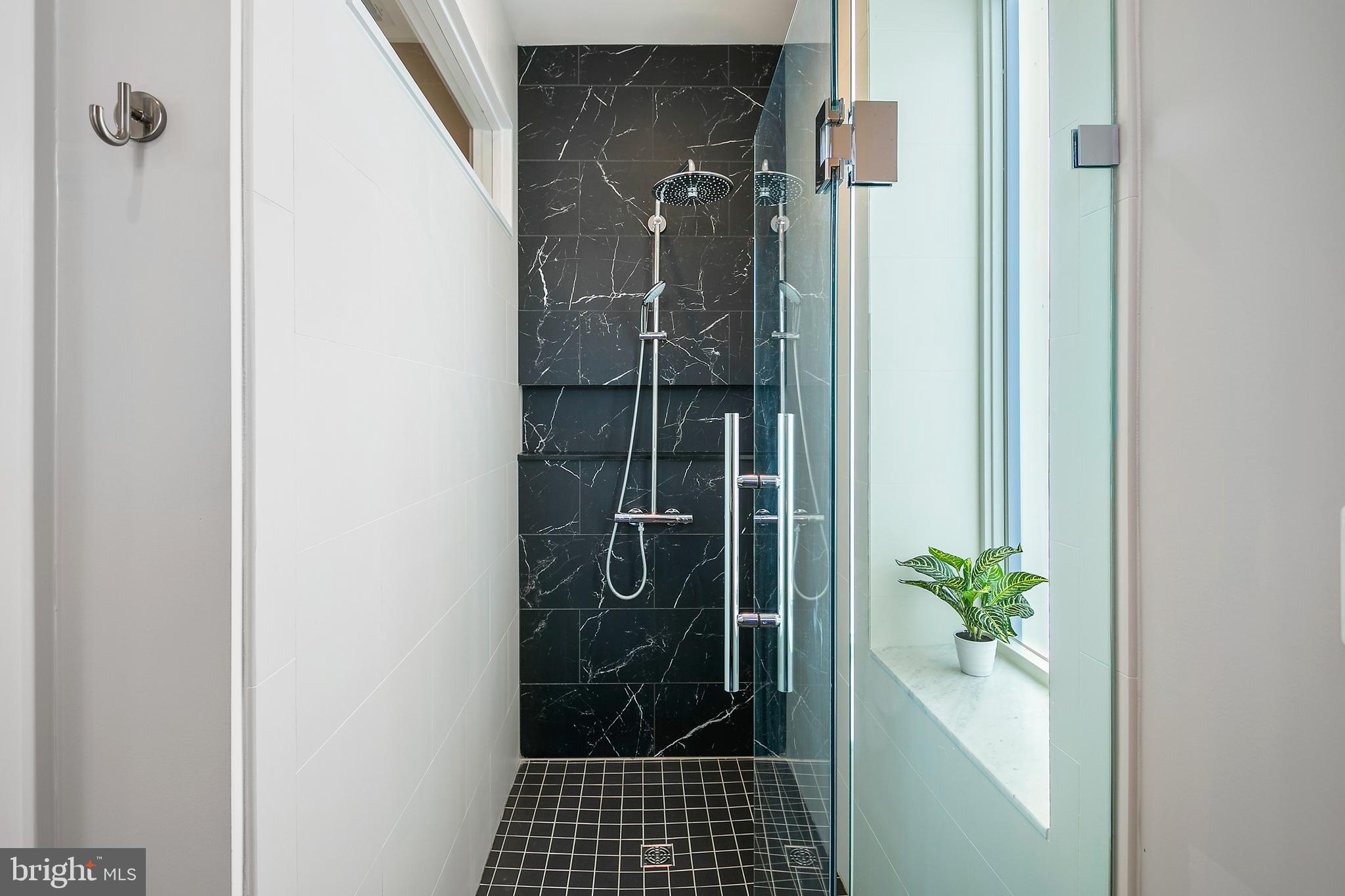 2139 N Street Northwest, Unit 4 Washington, DC 20037 - Photo 19 of 28 a bathroom with a shower