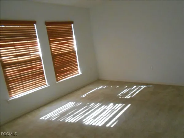 a view of a room with windows