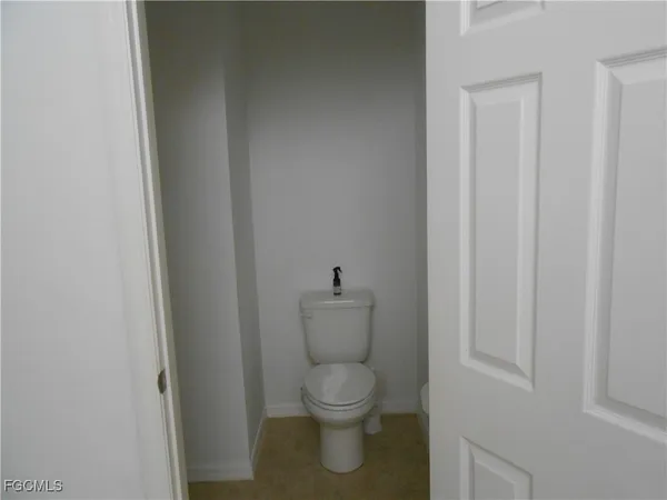 a bathroom with a toilet