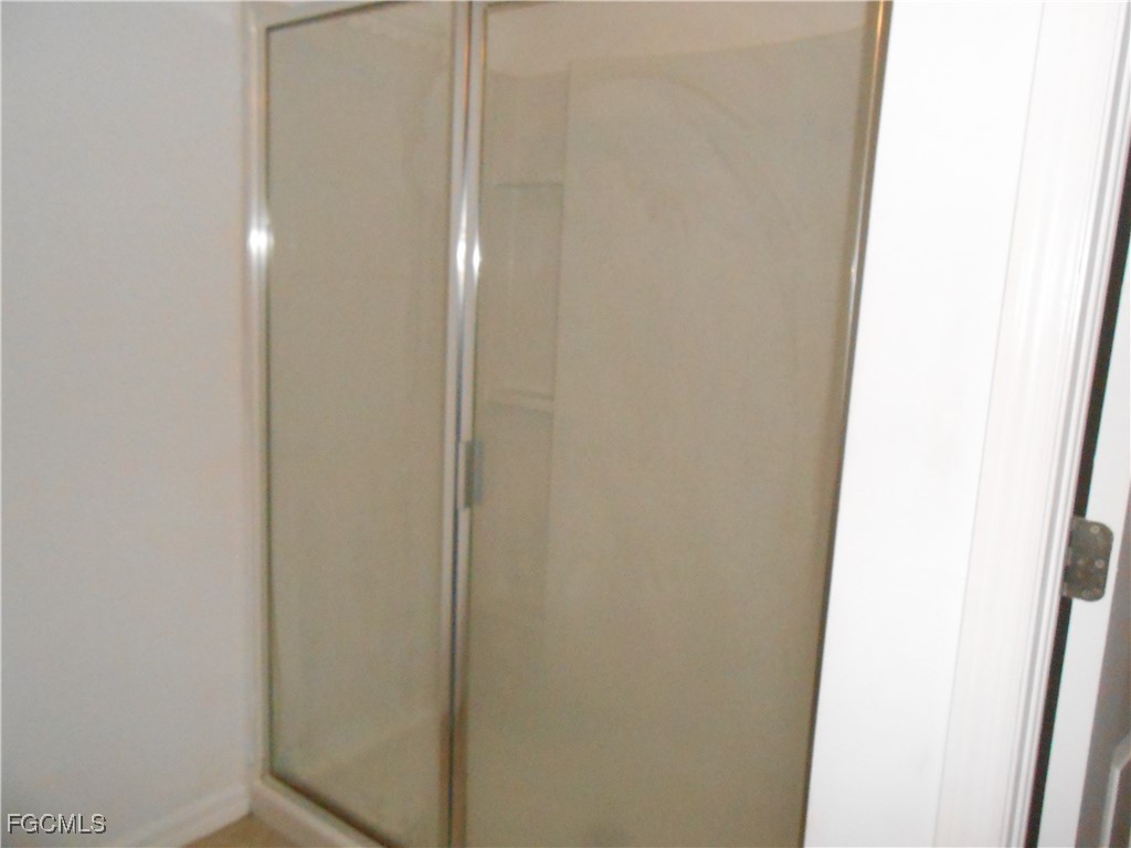 154 Shadowview Court Lehigh Acres, FL 33974 - Photo 21 of 40 a view of a bathroom