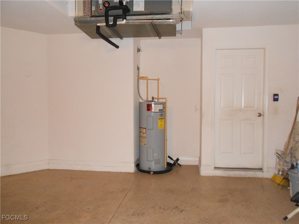 154 Shadowview Court Lehigh Acres, FL 33974 - Photo 35 of 40 a view of a storage & utility room