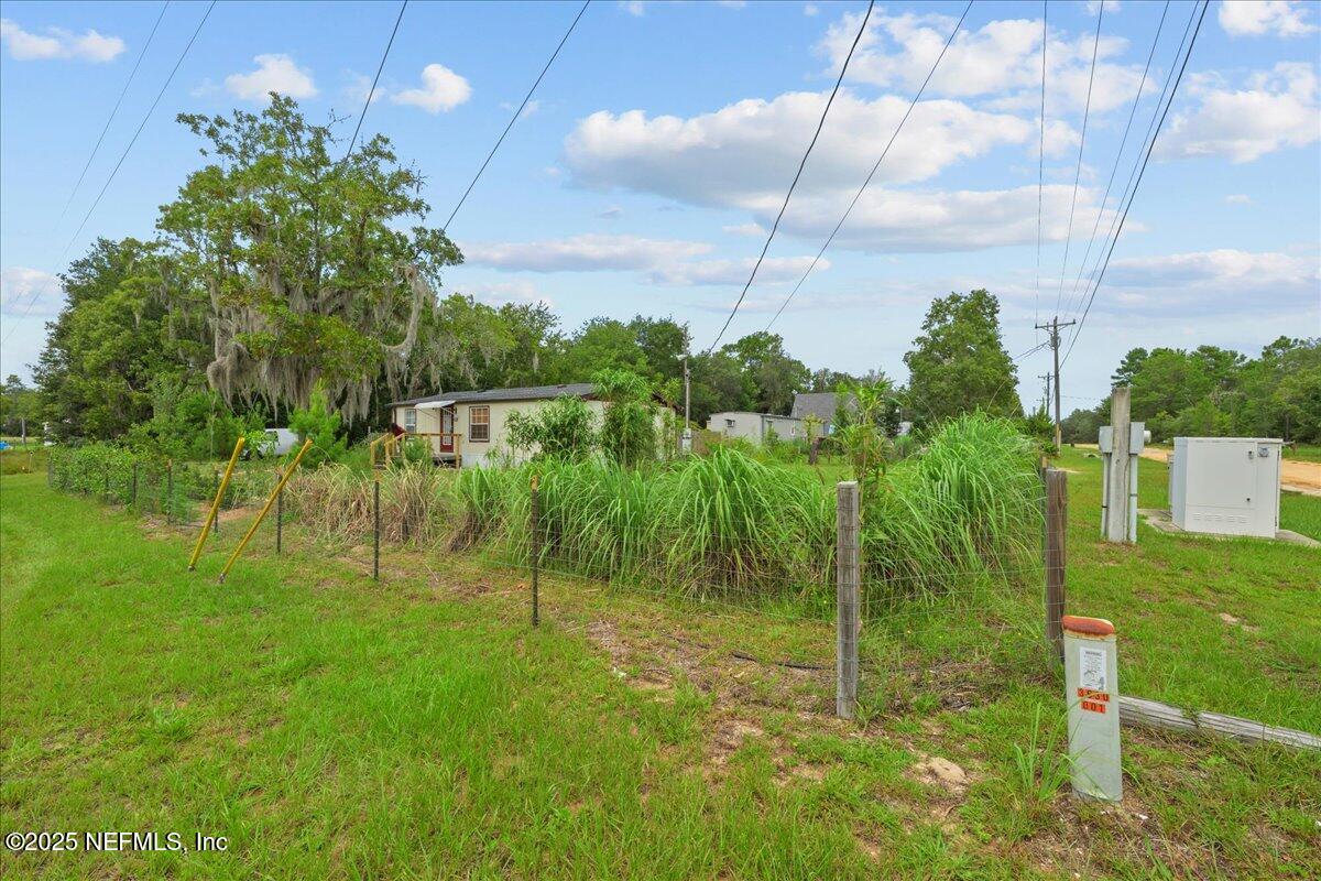 301 Kitty Avenue Interlachen, FL 32148 - Photo 2 of 23 a view of a garden
