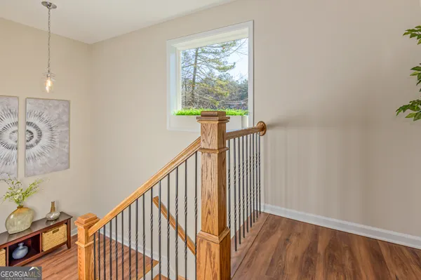 a view of entryway with wooden floor