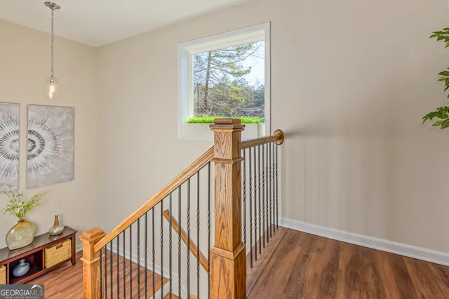 a view of entryway with wooden floor