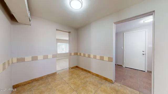 a view of an empty room with window