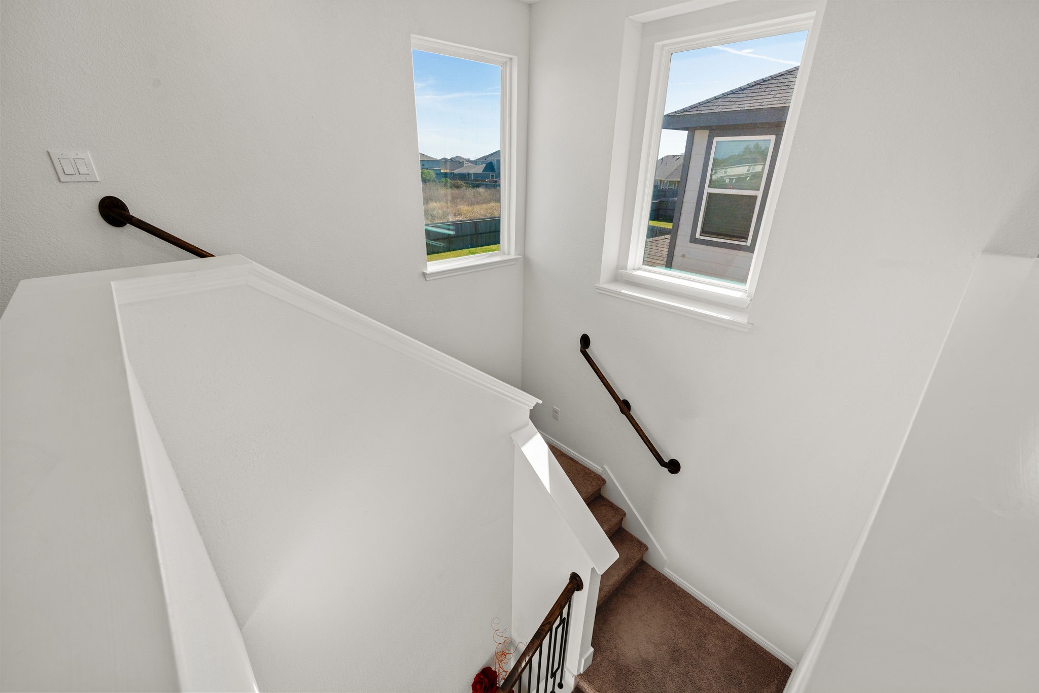 20811 Filbert Lane Katy, TX 77449 - Photo 18 of 43 a view of staircase with white walls and stairs