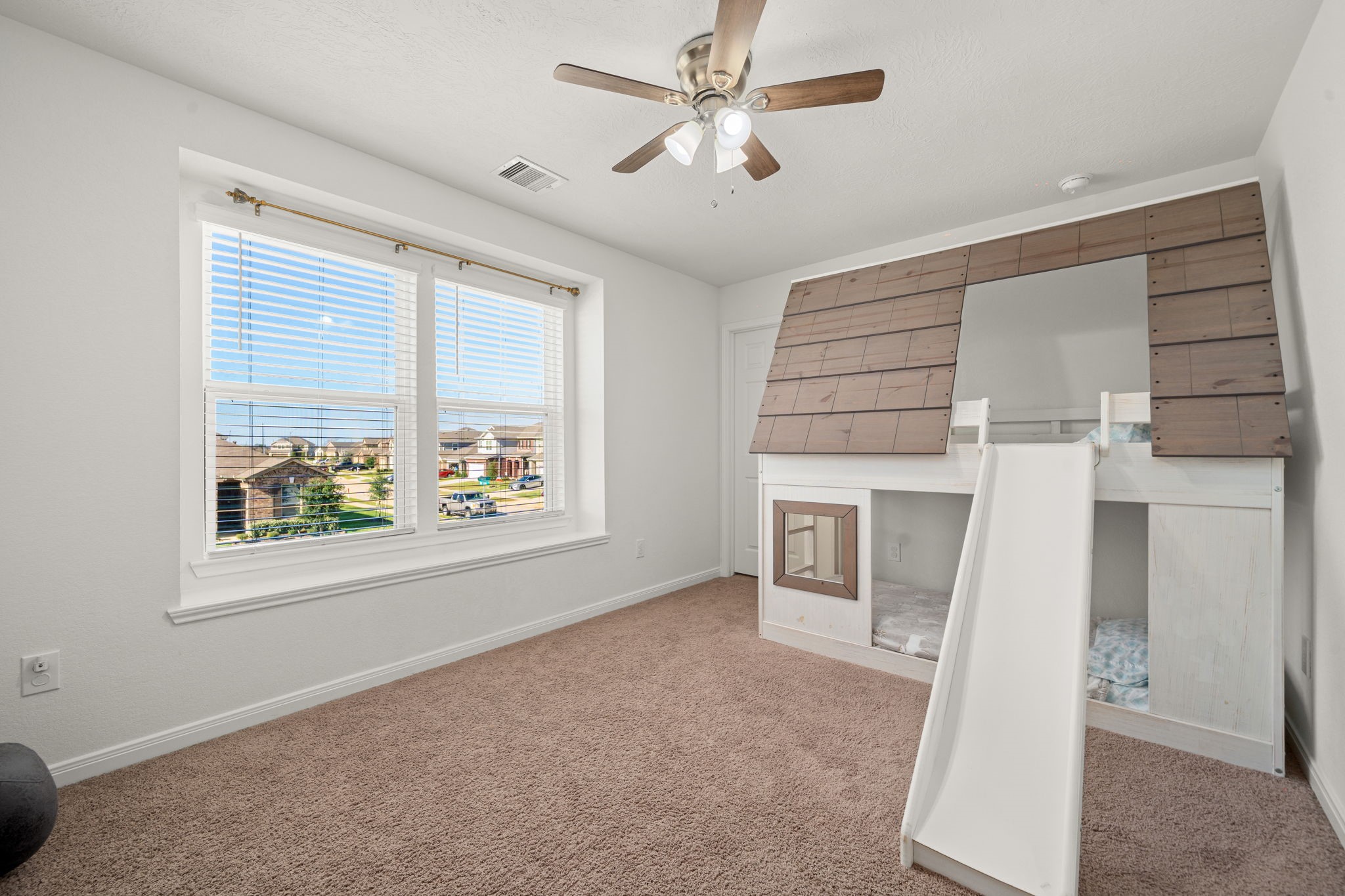 20811 Filbert Lane Katy, TX 77449 - Photo 24 of 43 a view of livingroom with a ceiling fan and window