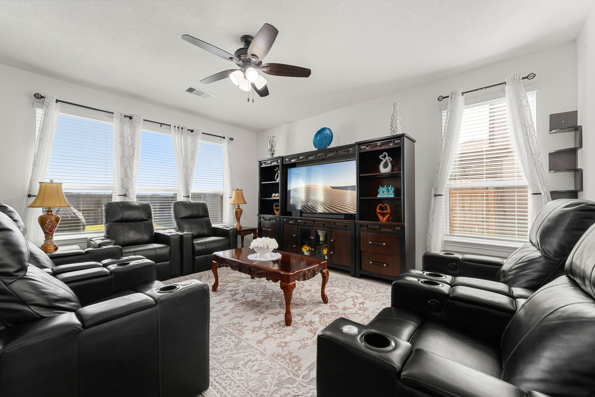 20811 Filbert Lane Katy, TX 77449 - Photo 5 of 43 a living room with furniture and a flat screen tv