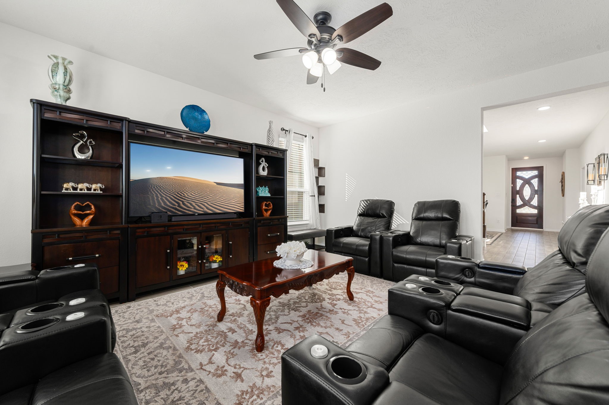 20811 Filbert Lane Katy, TX 77449 - Photo 6 of 43 a living room with furniture and a flat screen tv