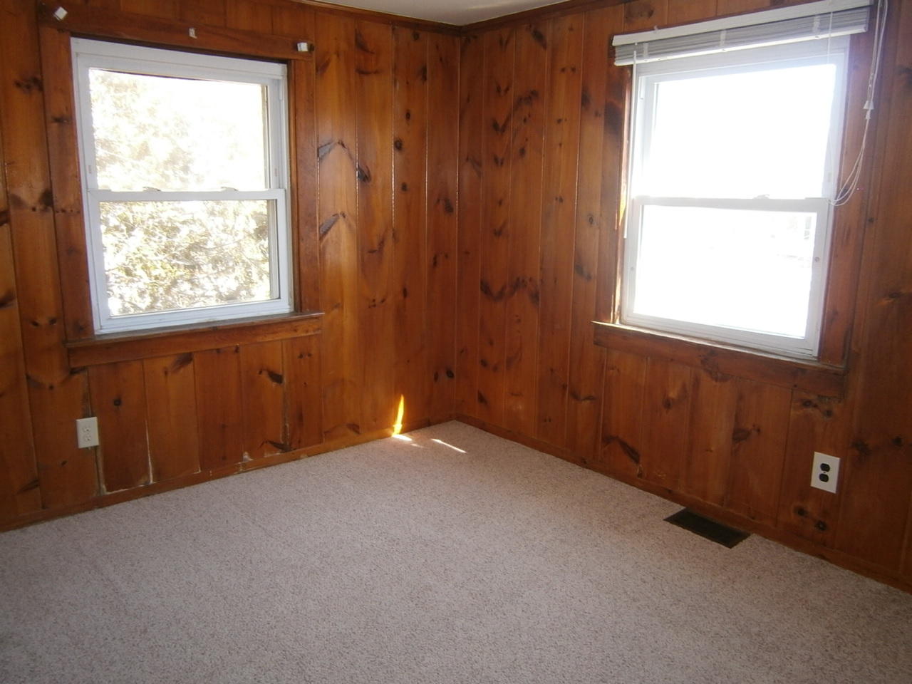 207 Captain Chase Road Dennis Port, MA 02639 - Photo 5 of 12 an empty room with a window