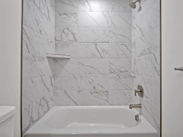 a bathroom with a bathtub