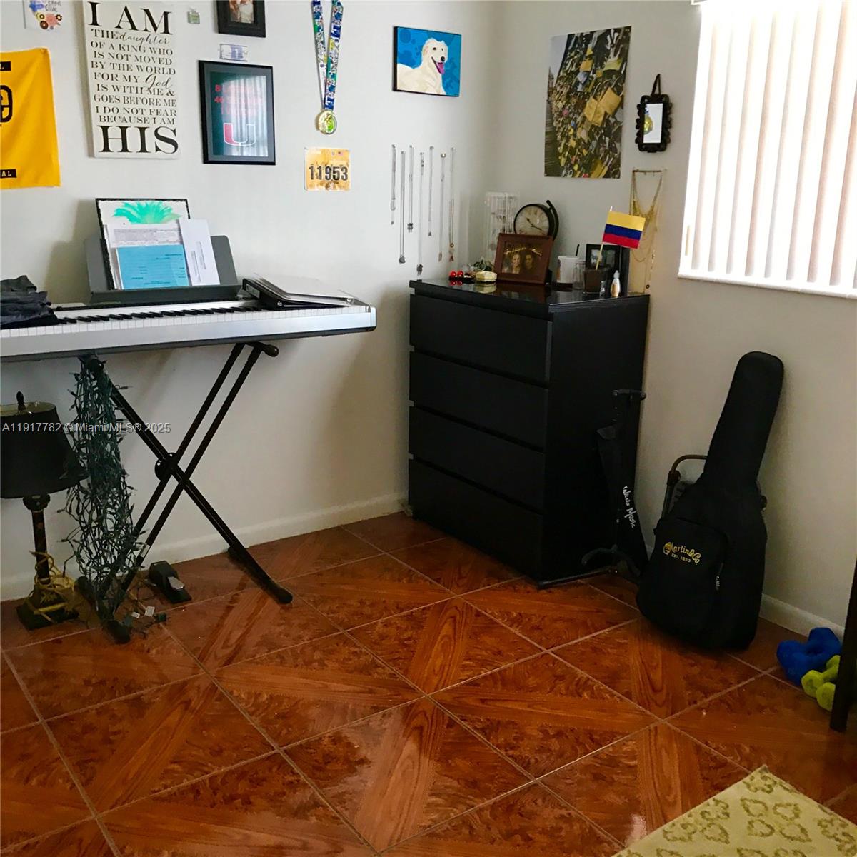 7328 Southwest 82nd Street, Unit B213 Miami, FL 33143 - Photo 14 of 22 a bedroom with a bed and a desk