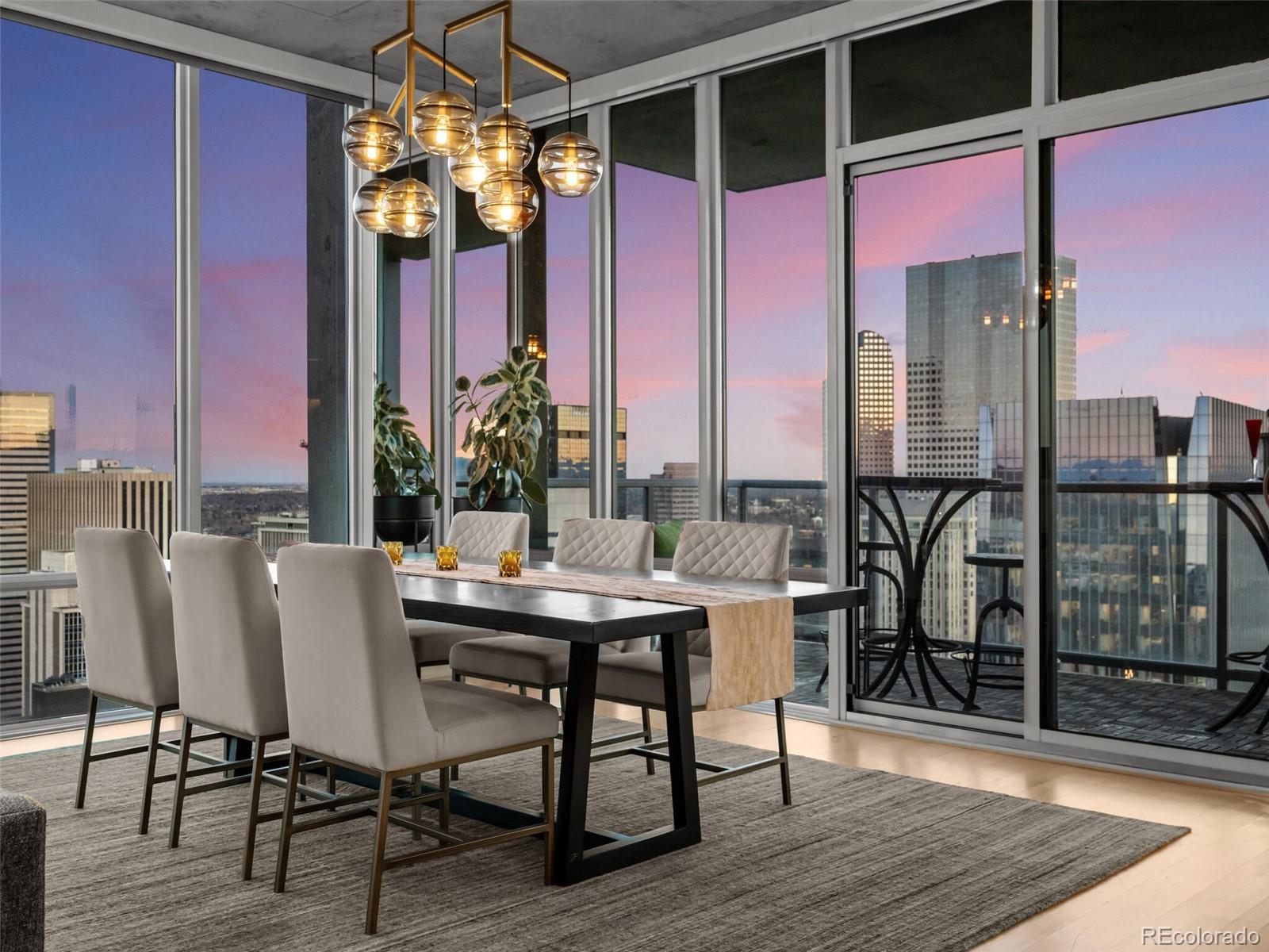 a view of a dining room with furniture and window