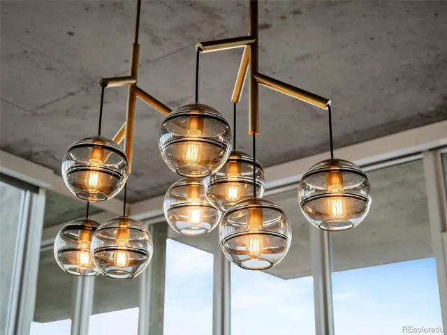 a view of a kitchen and dining room