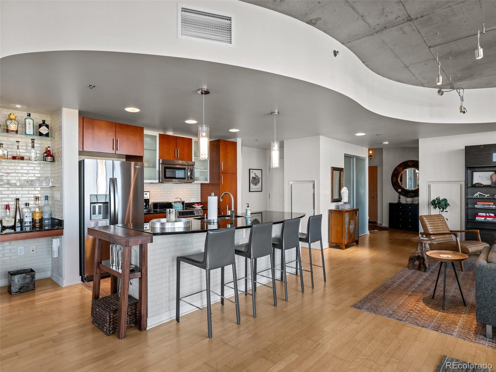 891 14th Street, Unit 4109 Denver, CO 80202 - Photo 13 of 50 a view of a kitchen and dining room