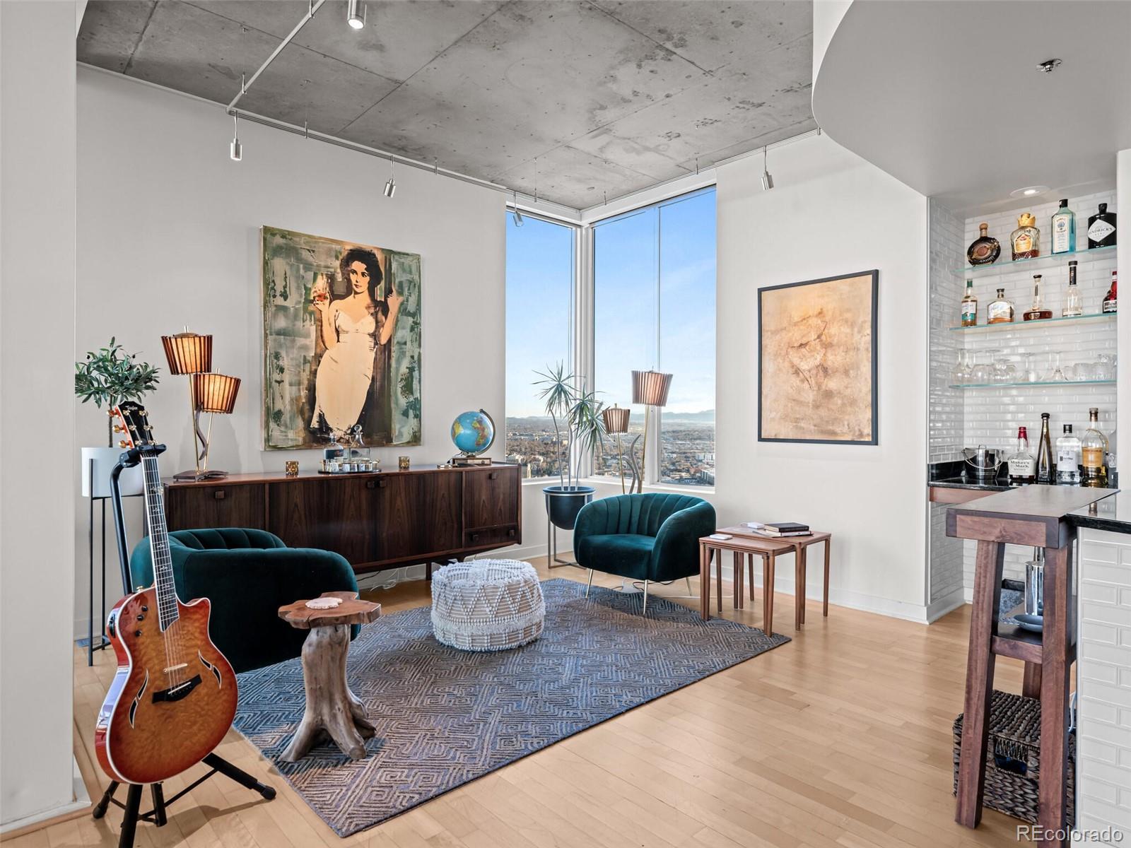 891 14th Street, Unit 4109 Denver, CO 80202 - Photo 16 of 50 a living room with furniture and wooden floor