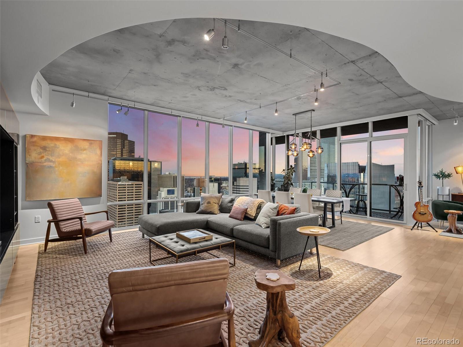 891 14th Street, Unit 4109 Denver, CO 80202 - Photo 2 of 50 a living room with furniture and a large window
