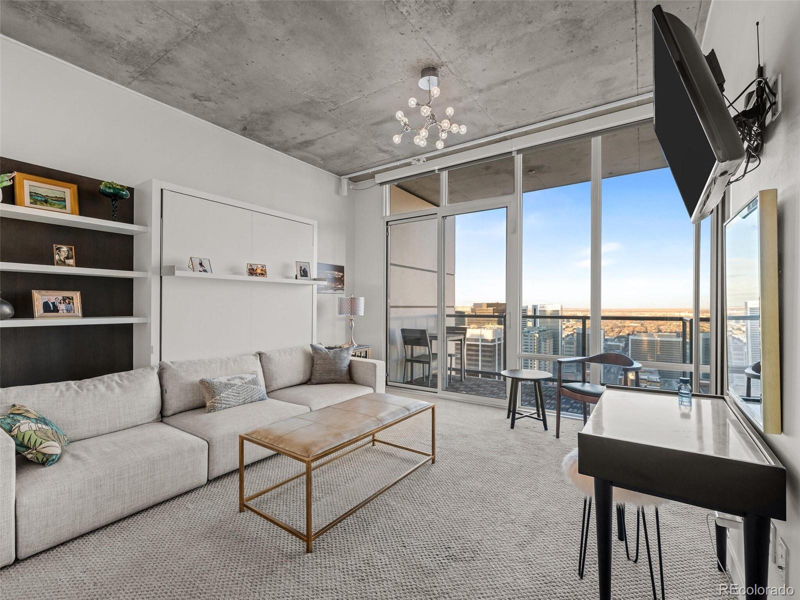 891 14th Street, Unit 4109 Denver, CO 80202 - Photo 22 of 50 a living room with furniture and a large window