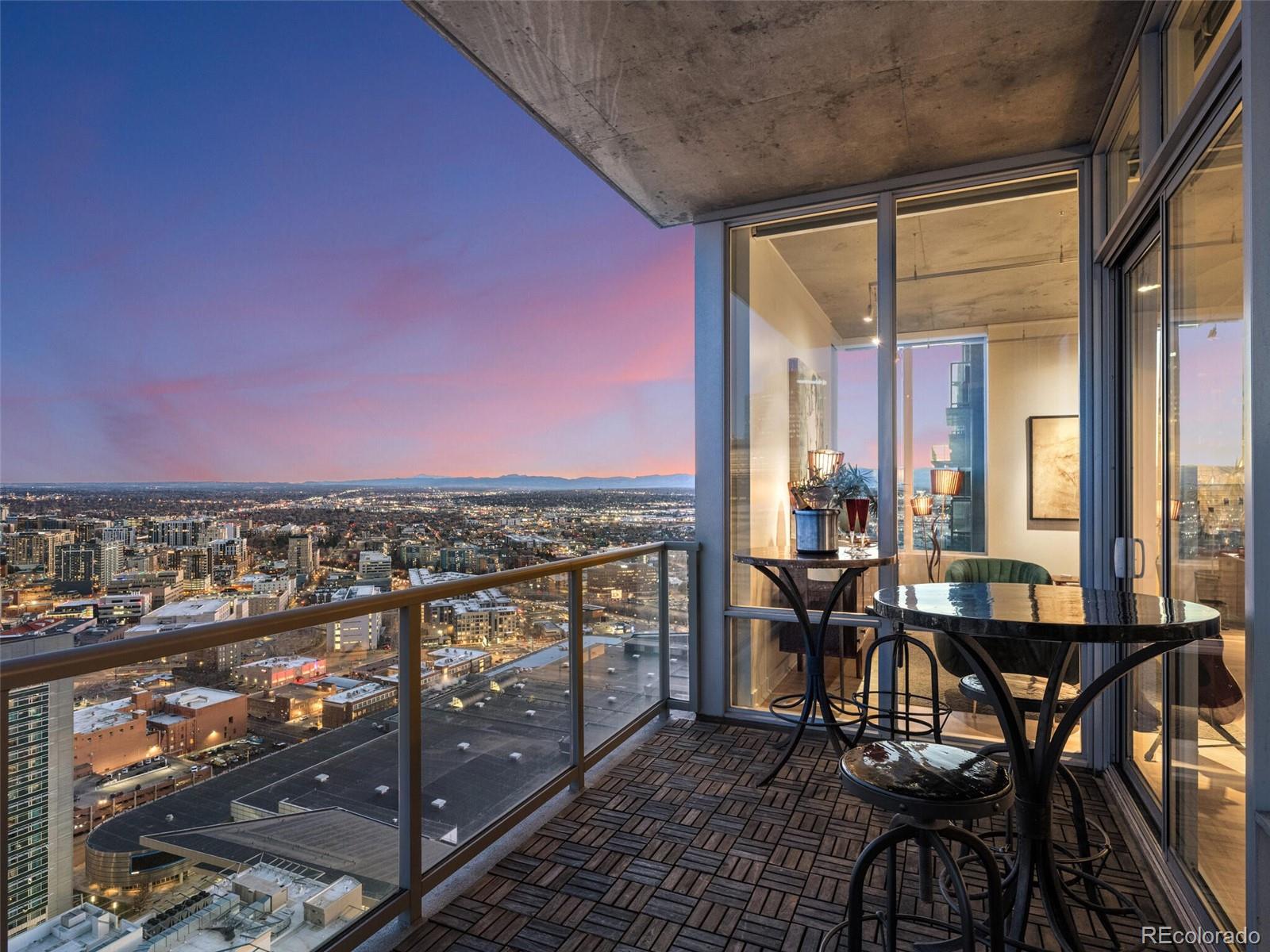 891 14th Street, Unit 4109 Denver, CO 80202 - Photo 28 of 50 a view of a chairs and table in a balcony