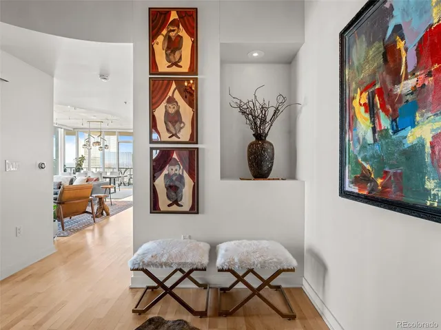 a city street lined with buildings and trees