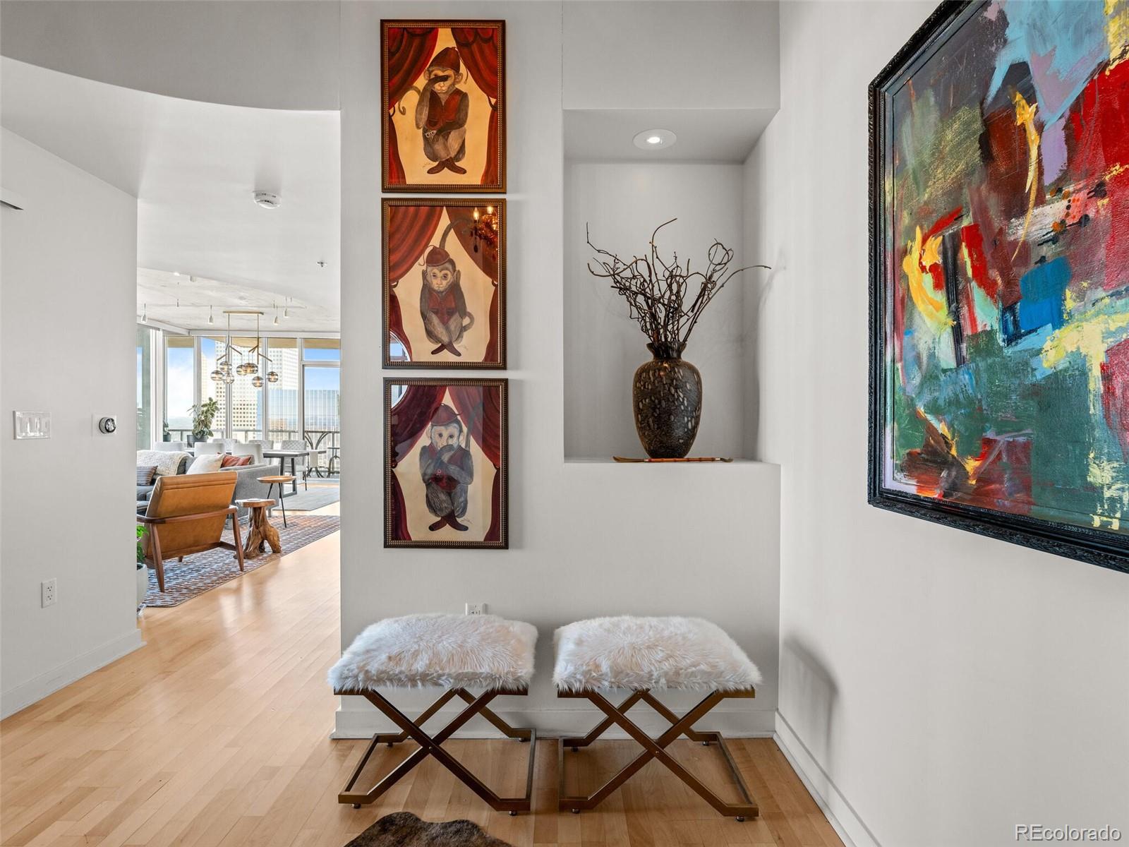891 14th Street, Unit 4109 Denver, CO 80202 - Photo 31 of 50 a view of a entryway with furniture and wooden floor