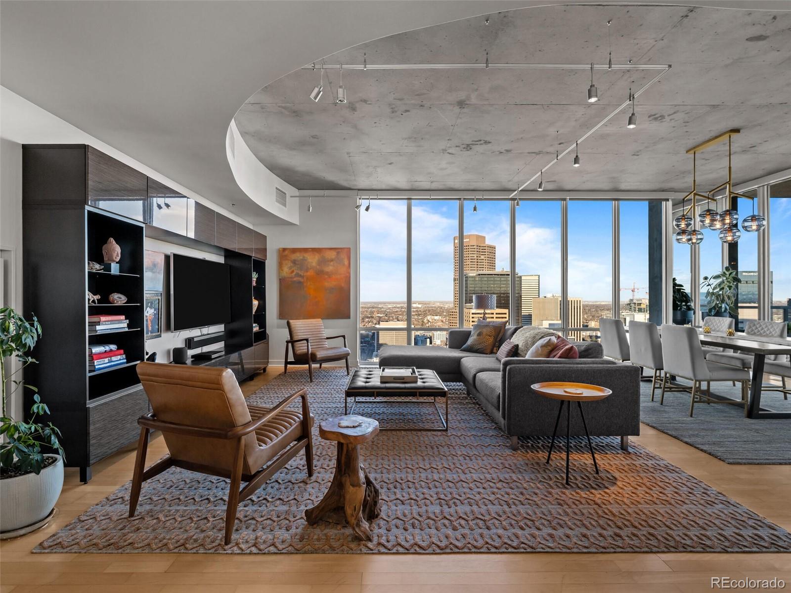 891 14th Street, Unit 4109 Denver, CO 80202 - Photo 7 of 50 a living room with furniture and a flat screen tv