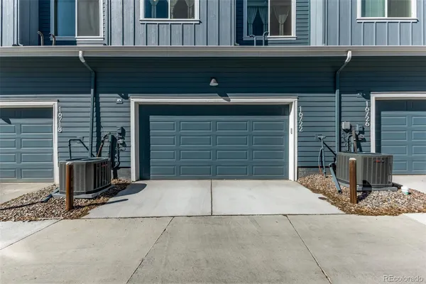 a front view of a house with a garage