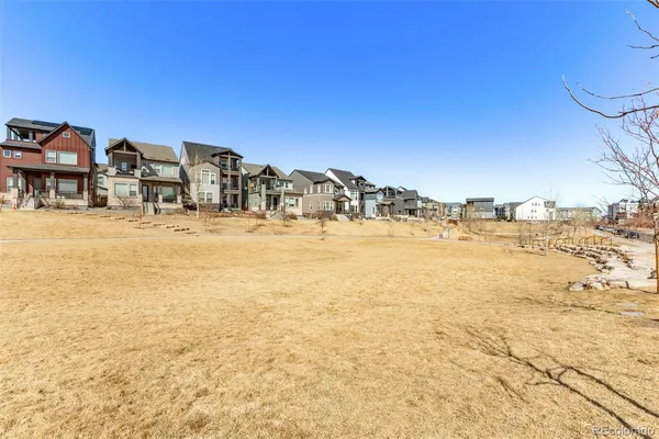 a view of residential houses with ocean view