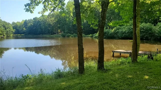 a view of a lake from a yard
