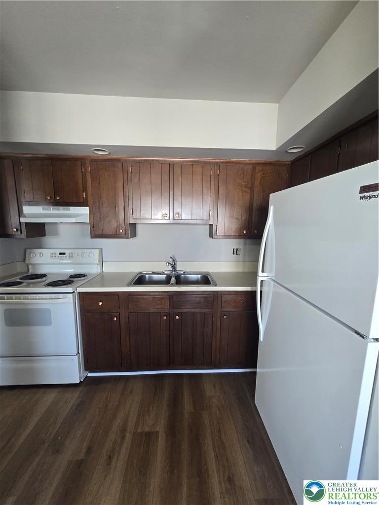188 Jefferson Street, Unit 3 Emmaus, PA 18049 - Photo 6 of 10 a kitchen with a refrigerator and a sink