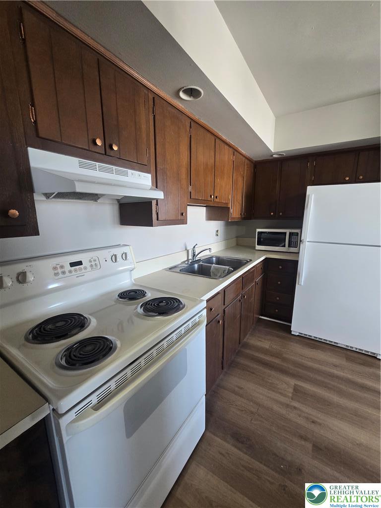 188 Jefferson Street, Unit 3 Emmaus, PA 18049 - Photo 7 of 10 a kitchen with a stove sink and cabinets