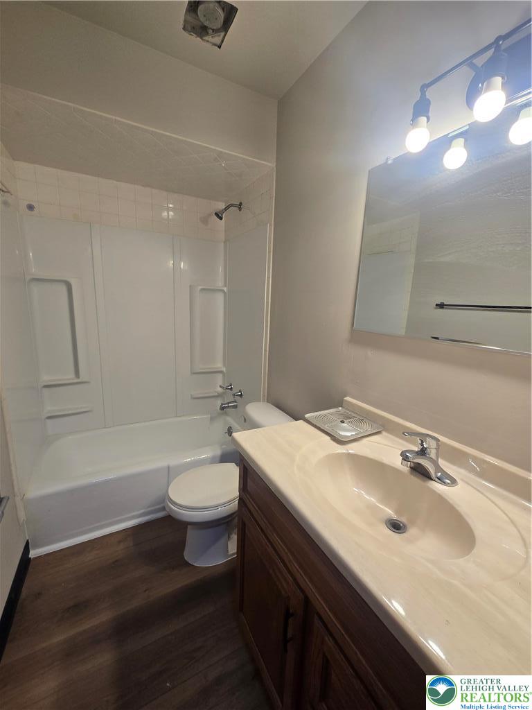 188 Jefferson Street, Unit 3 Emmaus, PA 18049 - Photo 9 of 10 a bathroom with a sink a toilet and shower