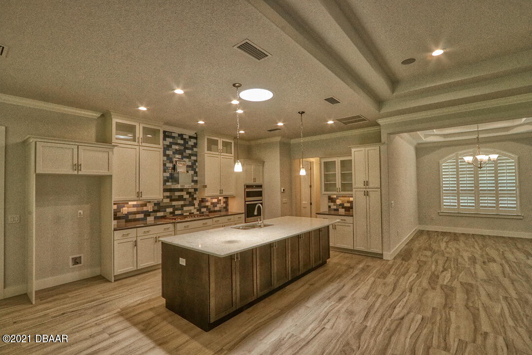 1320 Tullamore Boulevard Ormond Beach, FL 32174 - Photo 6 of 21 TOMOKA 1413 KitchenDining_6720 web