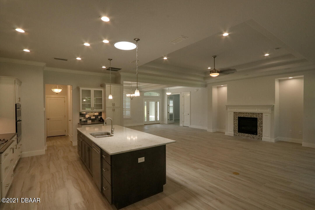 1320 Tullamore Boulevard Ormond Beach, FL 32174 - Photo 7 of 21 TOMOKA 1413 KitchGrtrmFoyr_6436 web