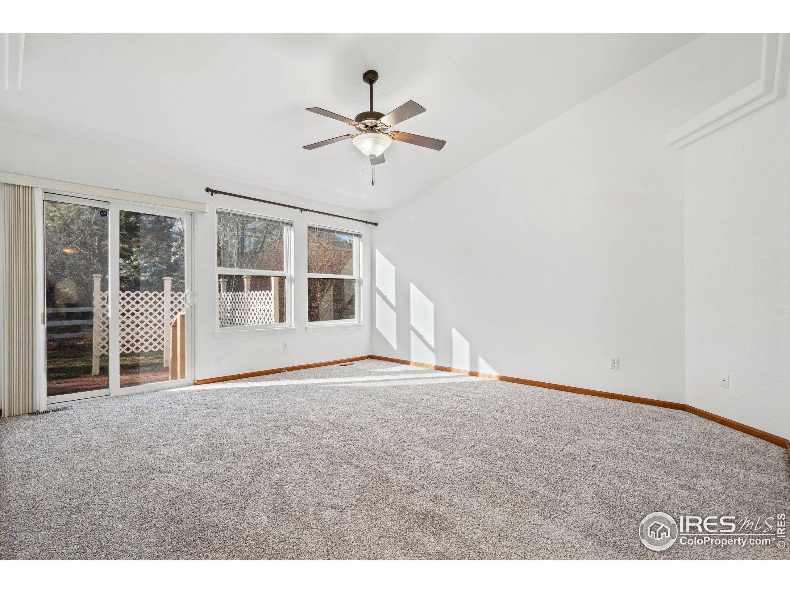 2239 Muir Lane Fort Collins, CO 80524 - Photo 13 of 31 a view of empty room with windows
