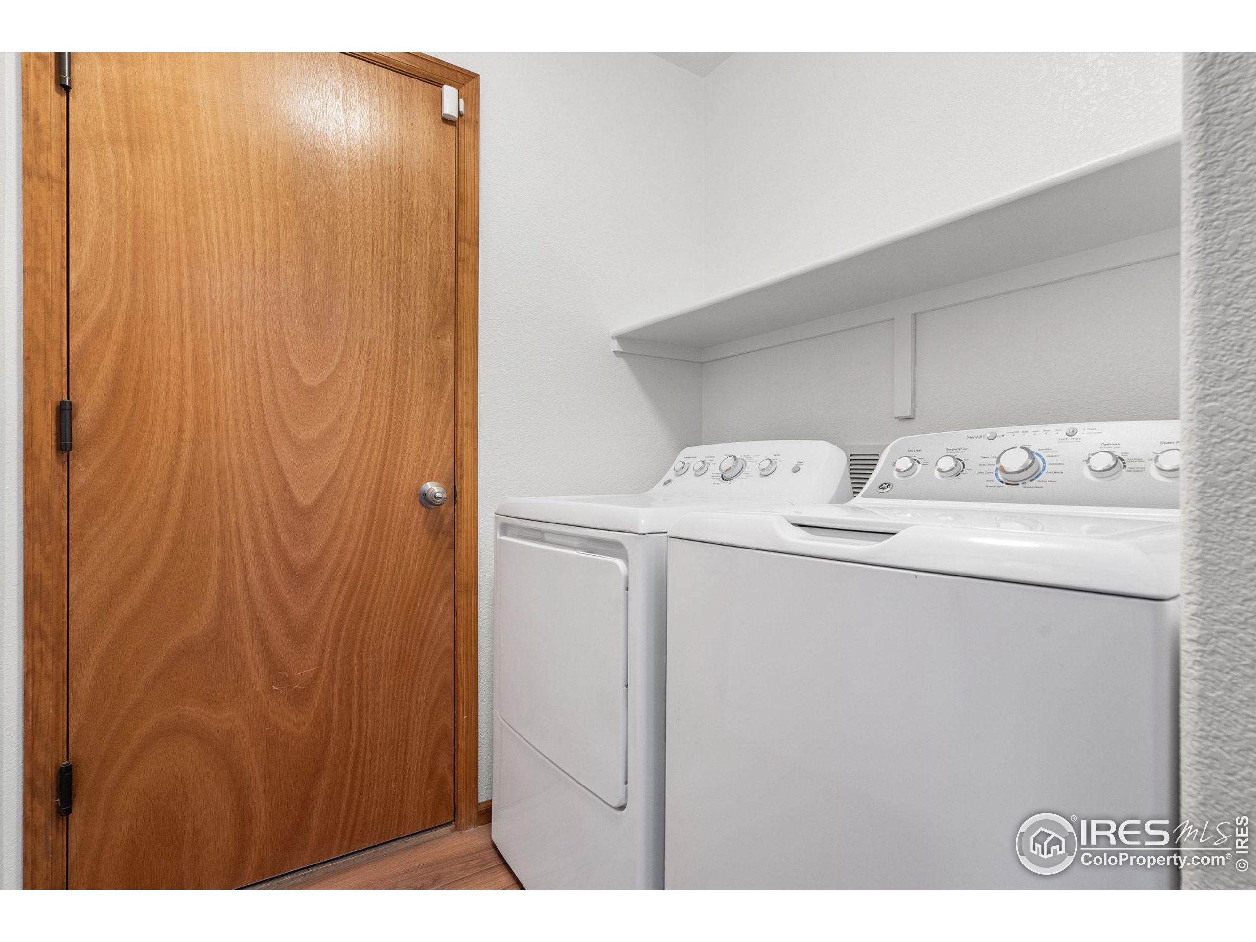 2239 Muir Lane Fort Collins, CO 80524 - Photo 14 of 31 a utility room with dryer and washer