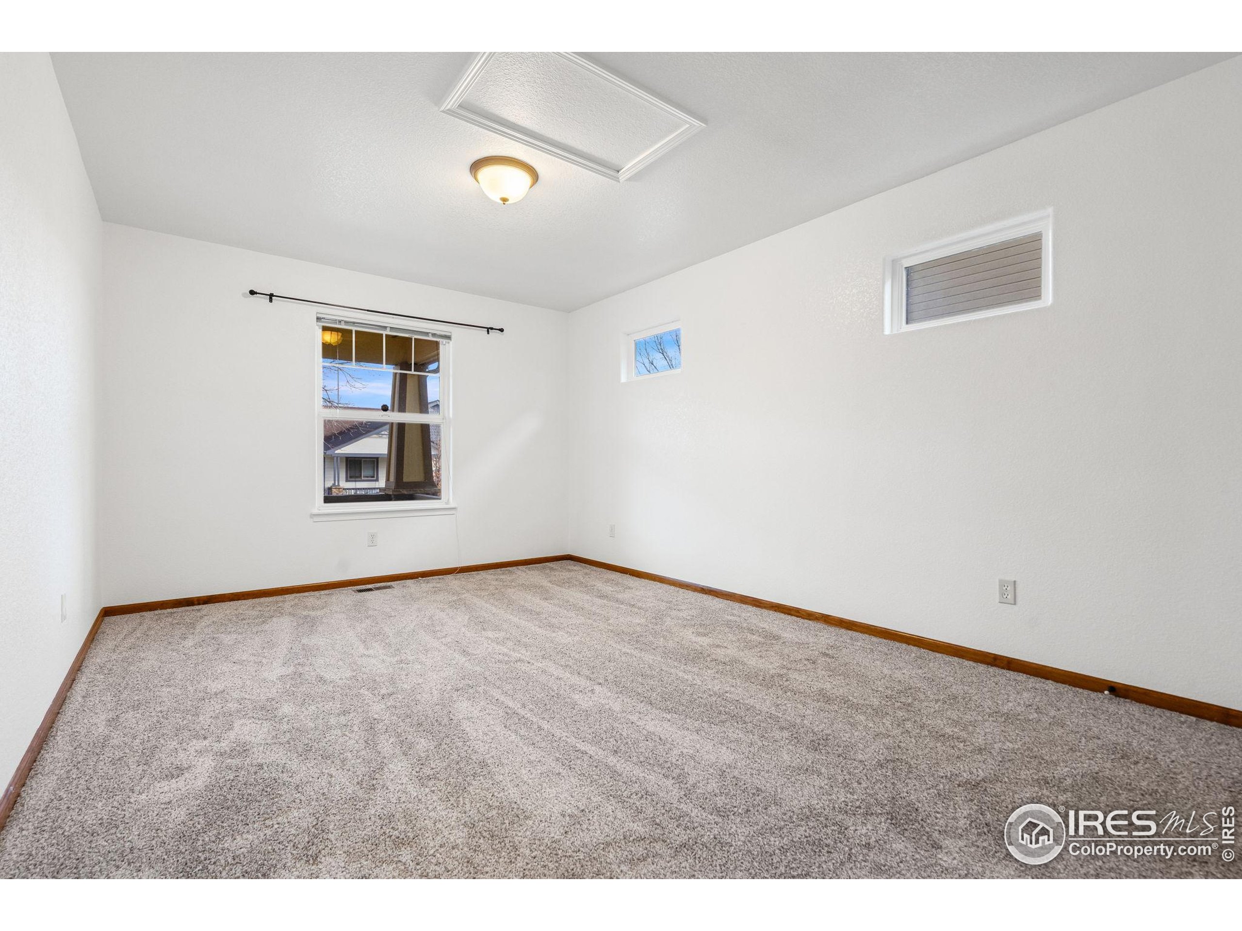 2239 Muir Lane Fort Collins, CO 80524 - Photo 17 of 31 a view of an empty room with window