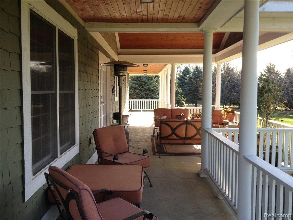 6338 Layton Road Fowlerville, MI 48836 - Photo 11 of 22 Wood/Ceiling Expansive Porches