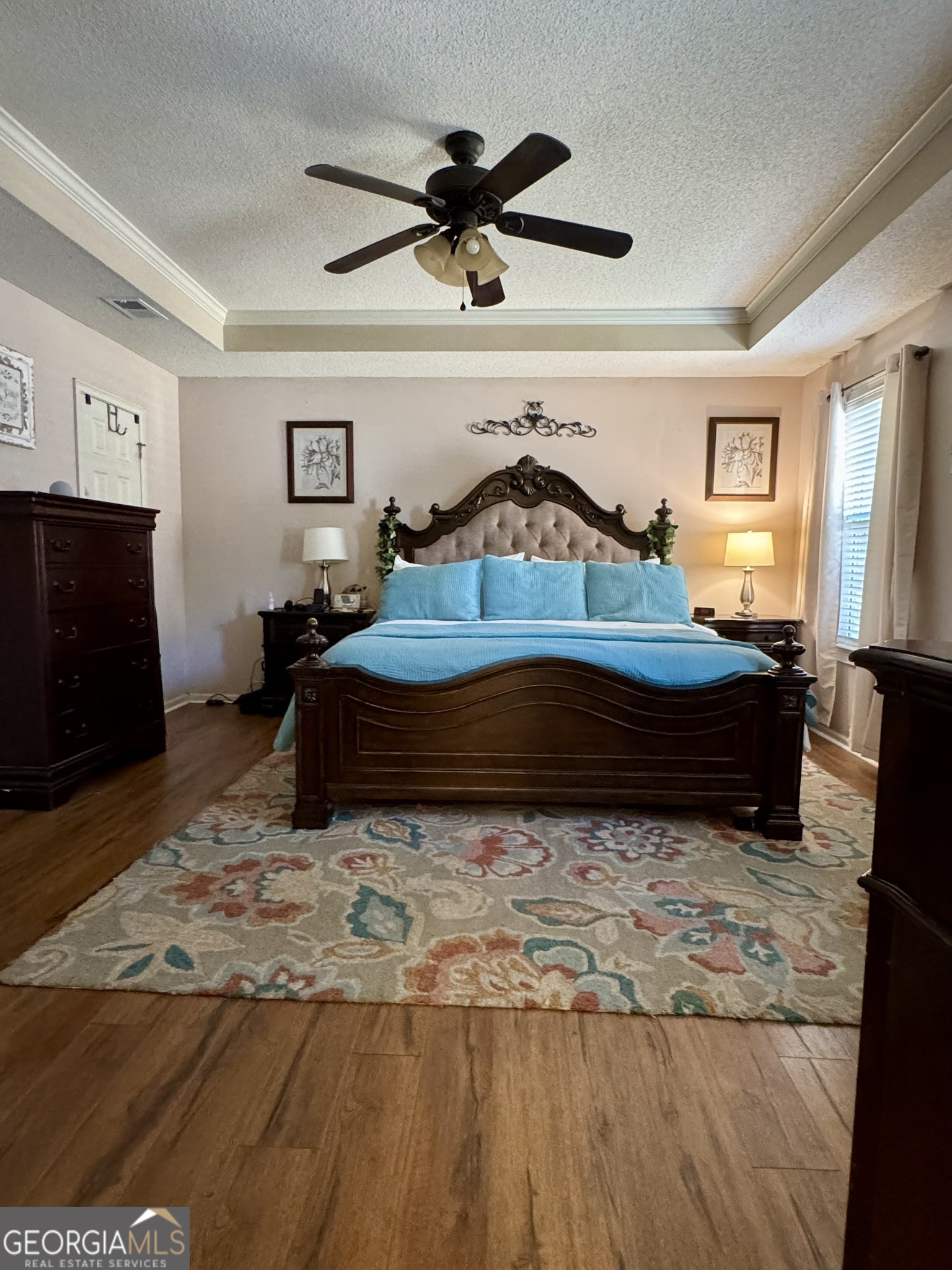 4633 Rustic Ridge Road Valdosta, GA 31602 - Photo 23 of 46 a living room with a bed furniture and a window